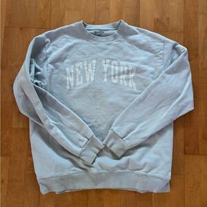 Brandy Melville John Galt Light Blue New York Sweatshirt